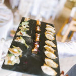circa events canapes served on large slate mix of options including gyozas, proscuitto bruschetta and salmon on pumpernickel