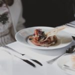 circa events starter menu antipasti meats on a white plate with milk toast on a table with white tablecloth