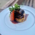 circa events braised short rib of beef with caramelised carrot with jus on a white plate