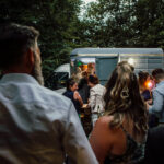 circa events street food van from the outside, guests queuing outside the van grey van in background